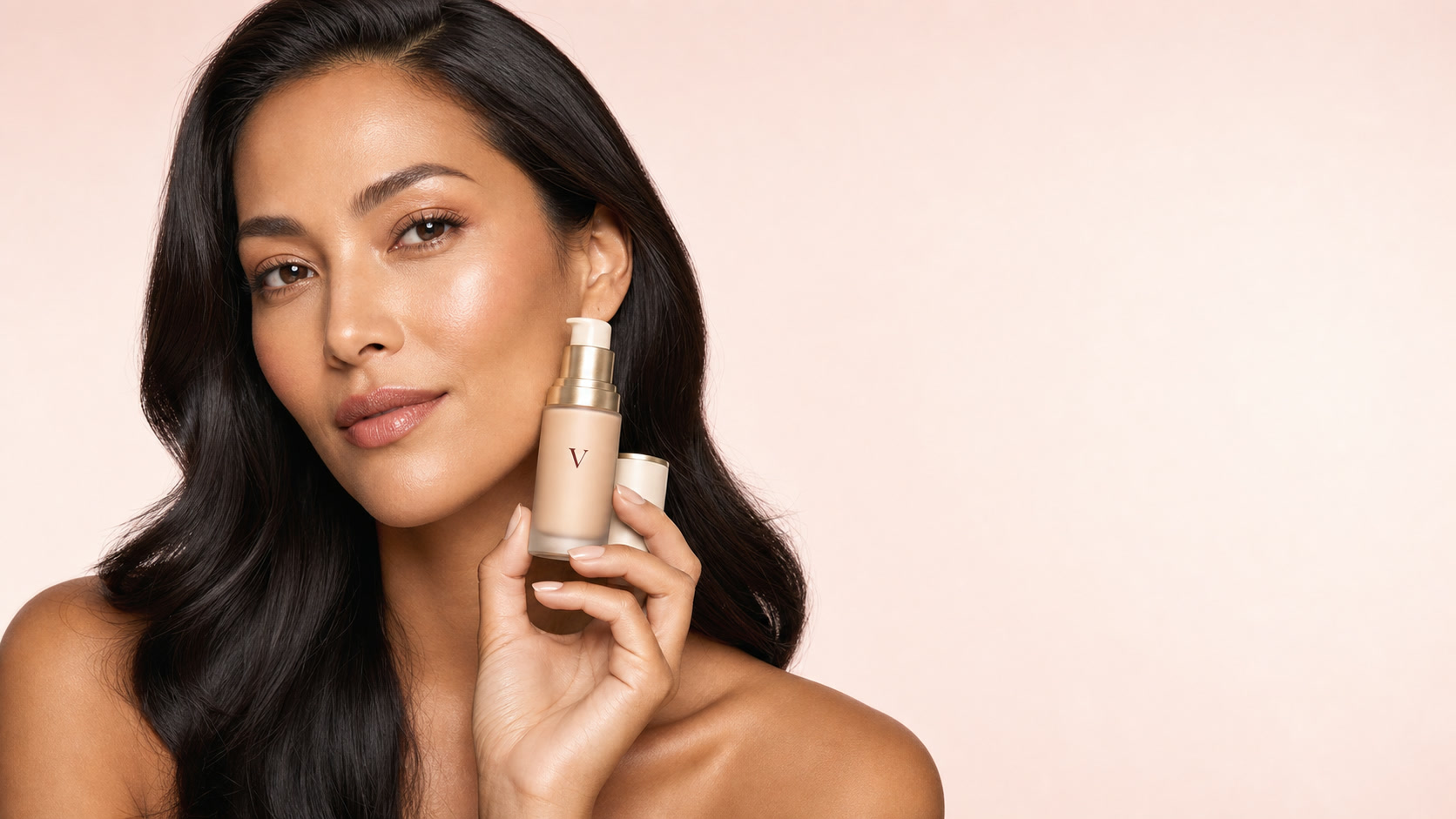 Model holding VELVA Skin Veil Tint